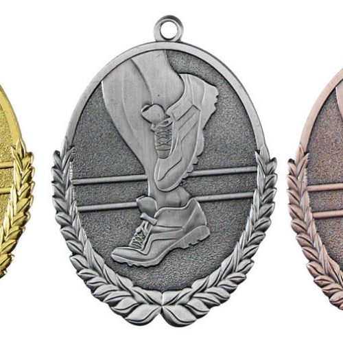 Löpning Tre medaljer på rad guld silver brons