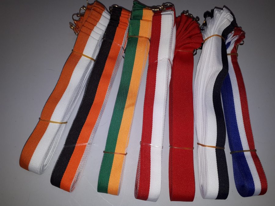 different medal ribbons red blue white green orange