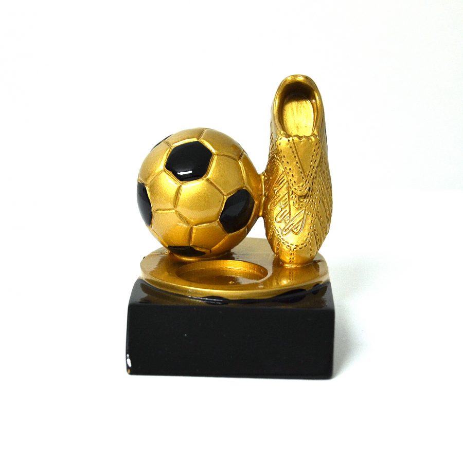 golden football shoe and football